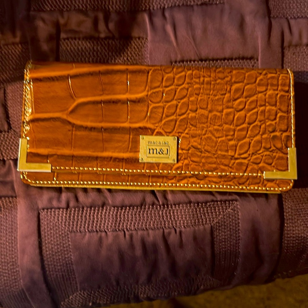 Wallet 8 1/2 with 4 inches high a quarter inch wide